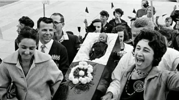 Segregationists harass 6 year old Ruby Bridges with a doll in a coffin. 