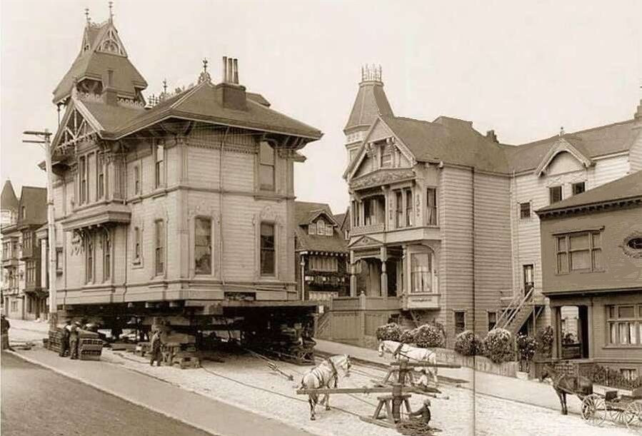 A horse-drawn Victorian house being transported. California, USA: San Francisco, 1908.