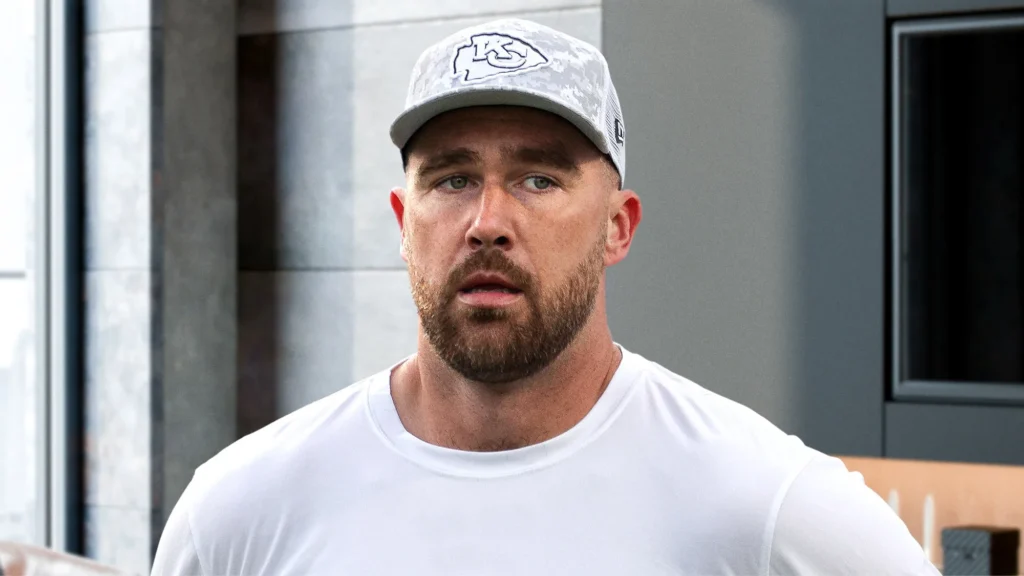 Travis Kelce nods at cat ring bearer bow ties for Taylor Swift wedding, per satirical August 2025 news.