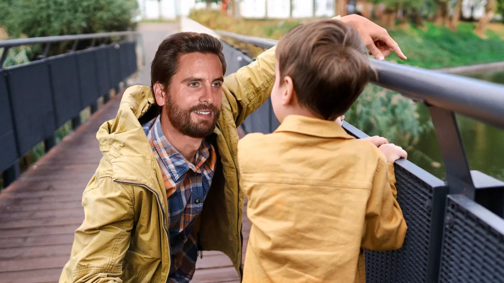 Scott Disick discussing hereditary loserism with his son in Los Angeles, per emotional warning about genetic risks.