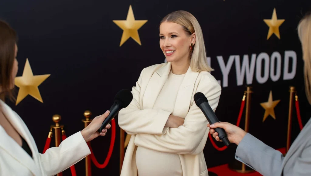 Celebrity claims unborn baby is trans at gender reveal, per satirical September 2025 news.